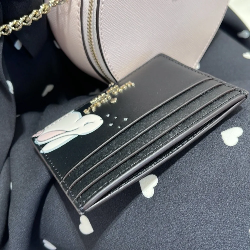 Kate Spade Bunbun Bunny Small Slim Card Holder Wallet

COLOR:
Black Multi
NWT - Picture 10 of 16